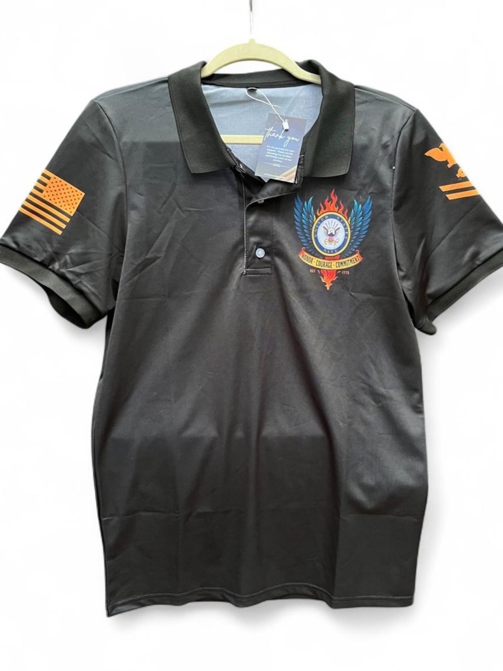 Black Men's Polo with Embroidered Crest and Orange Sleeve Accents